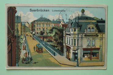 Ansichtskarte Litho AK Saarbrücken 1919 Luisenbrücke Staßenbahn Geschäft Leonhard Bauer Reklame Architektur Ortsansicht Saarland